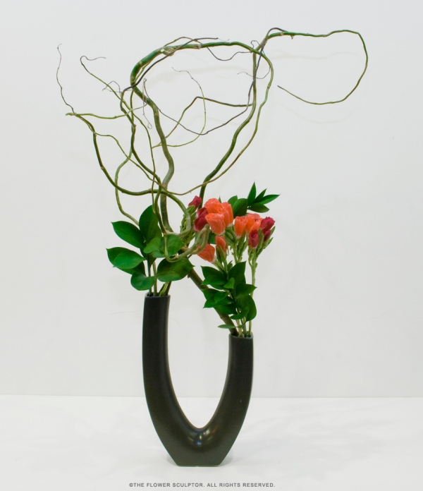 Godetia with Curly Willow and Italian Ruscus